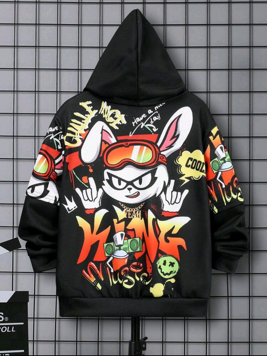 Hoodie with a graphic phrase and cartoon drawings of a boy